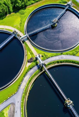 aerial-view-sewage-treatment-plant-dusk-featuring-circular-tanks_187882-8094 aerial-view-sewage-treatment-plant-dusk-featuring-circular-tanks_187882-8094
